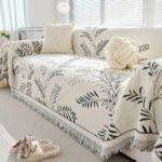 Premium Jacquard Botanical Sofa Cover Throw – Soft Woven Floral Leaf Couch Slipcover with Fringe Trim (Cream & Black, 3-Seater)